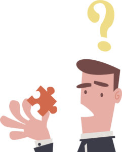 Confused man looking at puzzle piece